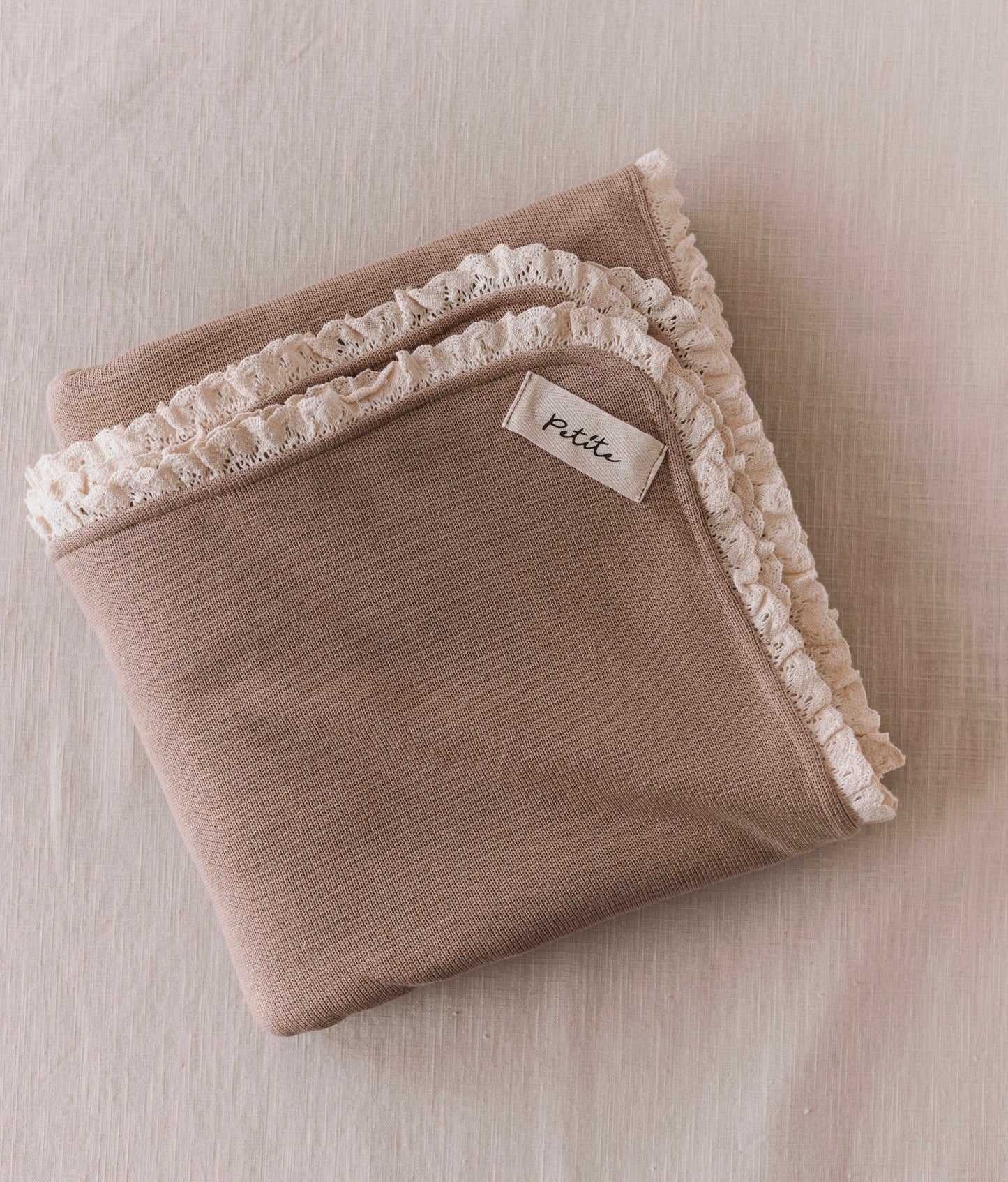 Dark beige baby blanket with lace