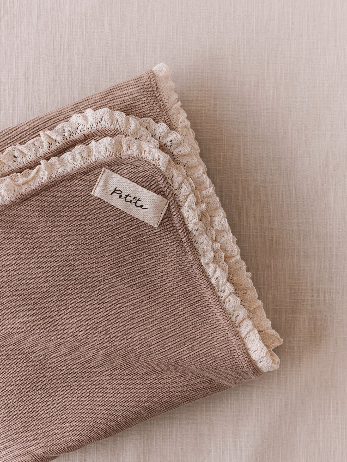 Dark beige baby blanket with lace