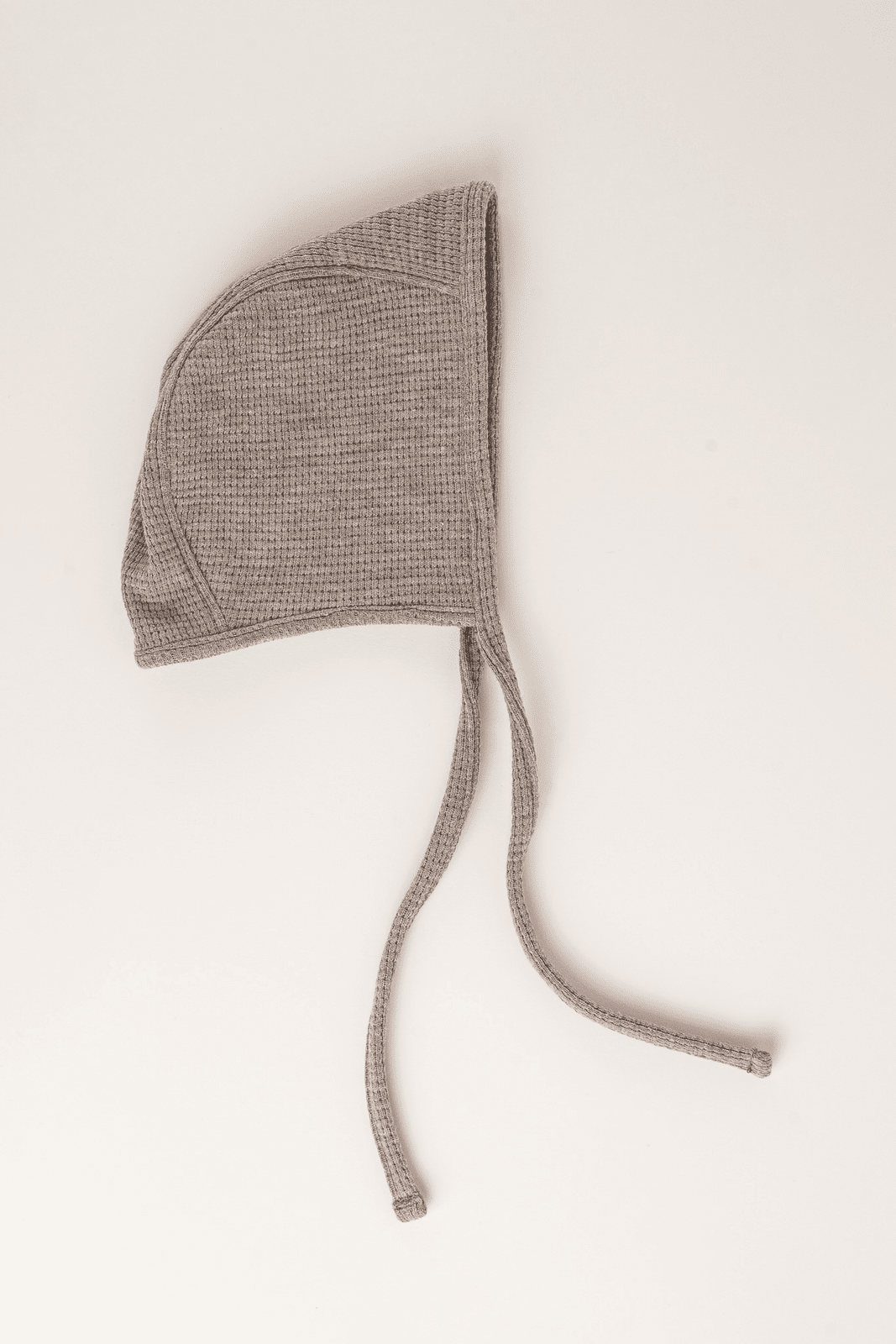 Beige knitted baby hat (-20%)